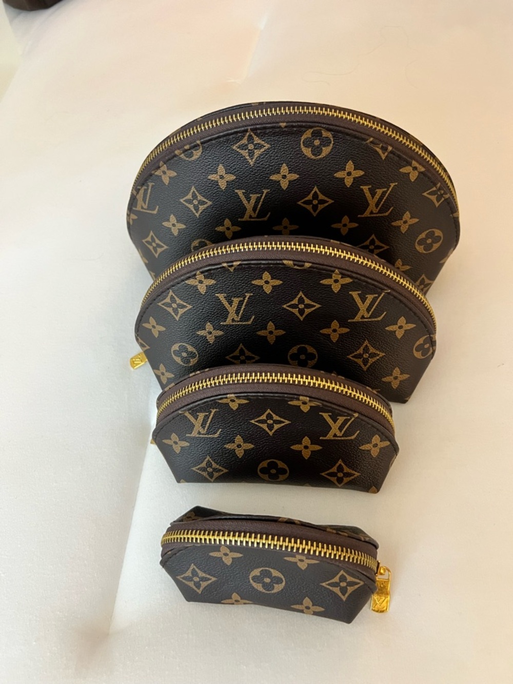 Louis Vuitton Monogram Canvas Cosmetic Pouch Set in Brown and Gold